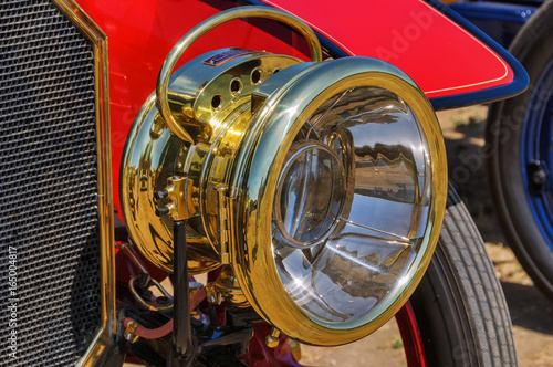 Close up view of antique car headlight © Lux Blue