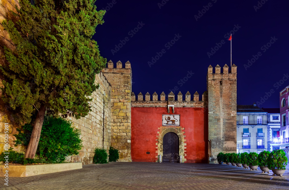 Gates to Real Alcazar Gardens in Seville Spain
