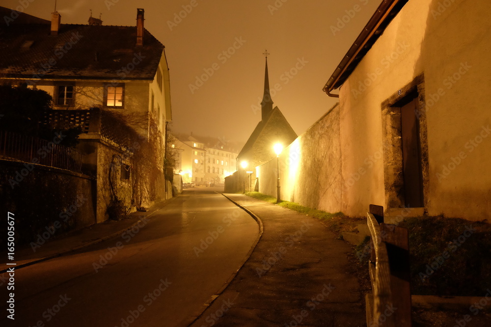 Chapel on a foggy winter evening in Fribourg
