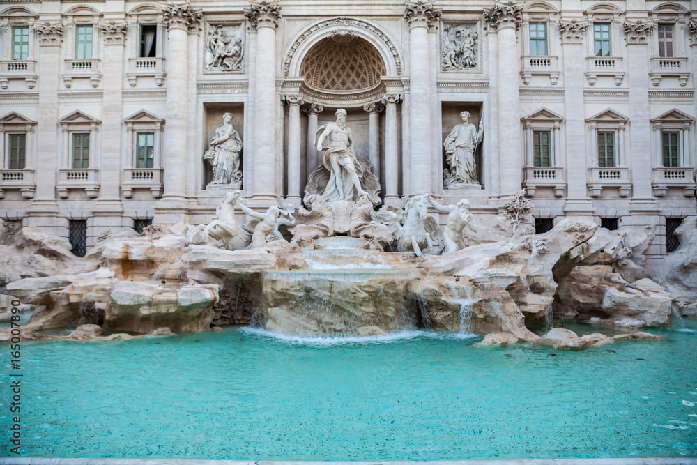Trevi fountain, Rome, Italy. Rome facade architecture and landmark. Rome Trevi fountain is one of the main attractions of Rome and Italy. The tradition of throwing coins into fountain.Background