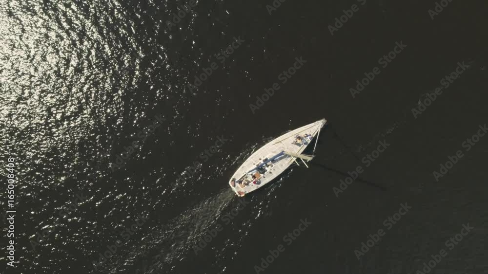 Aerial view of people resting on a yacht Aerial view of people resting on a yacht