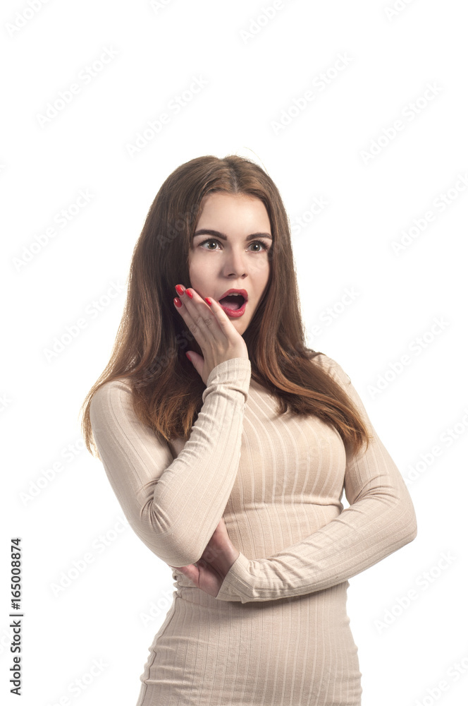 Emotions of beautiful girl in a beige dress. Emotions of beautiful girl in a beige dress.