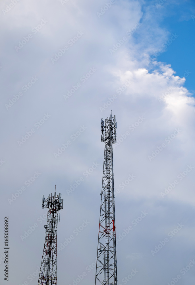 Mobile phone communication two tower transmission signal with blue sky background