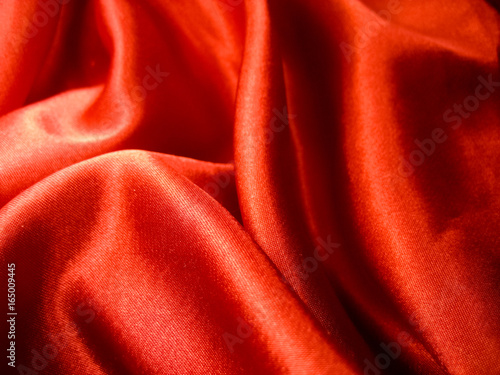 Red silk waves background texture