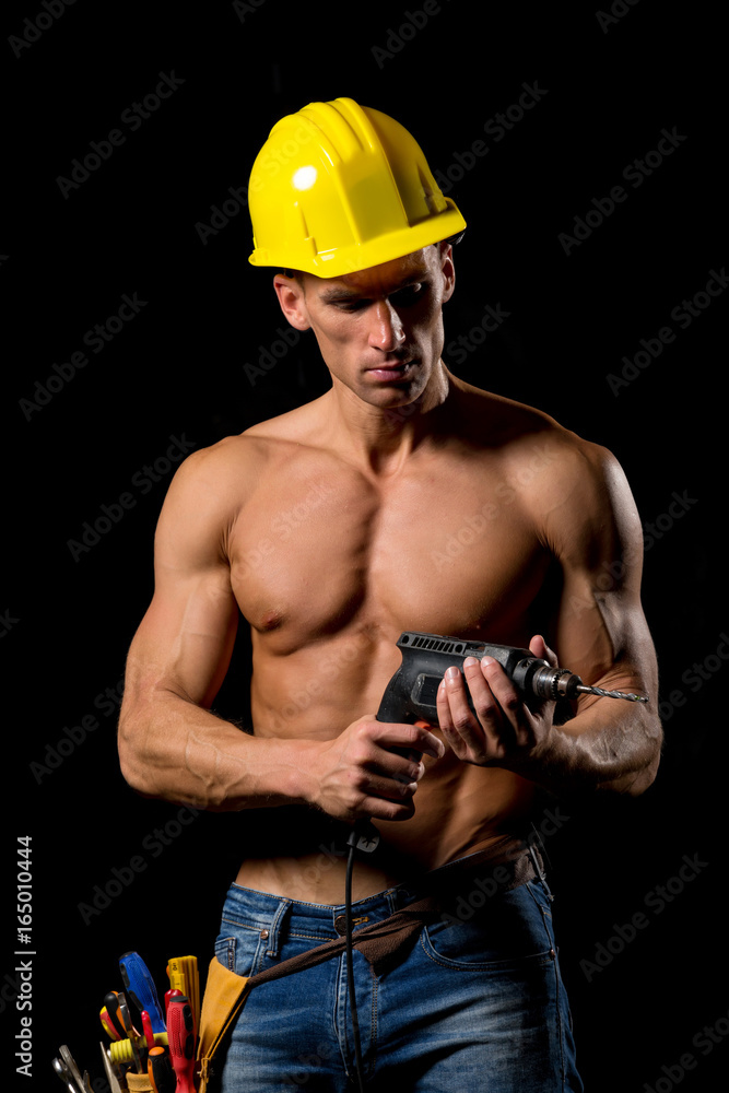 fit shirtless worker with tools fit shirtless worker with tools