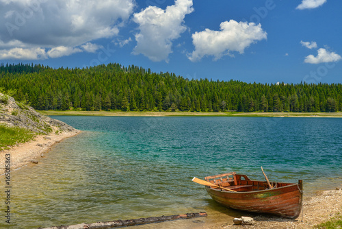 Fototapeta Naklejka Na Ścianę i Meble -  Boat on the coast of Black Lake