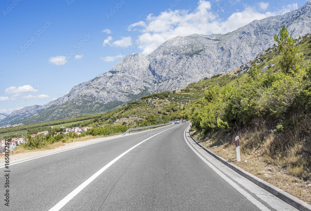 Asphalt road in a sunny day.