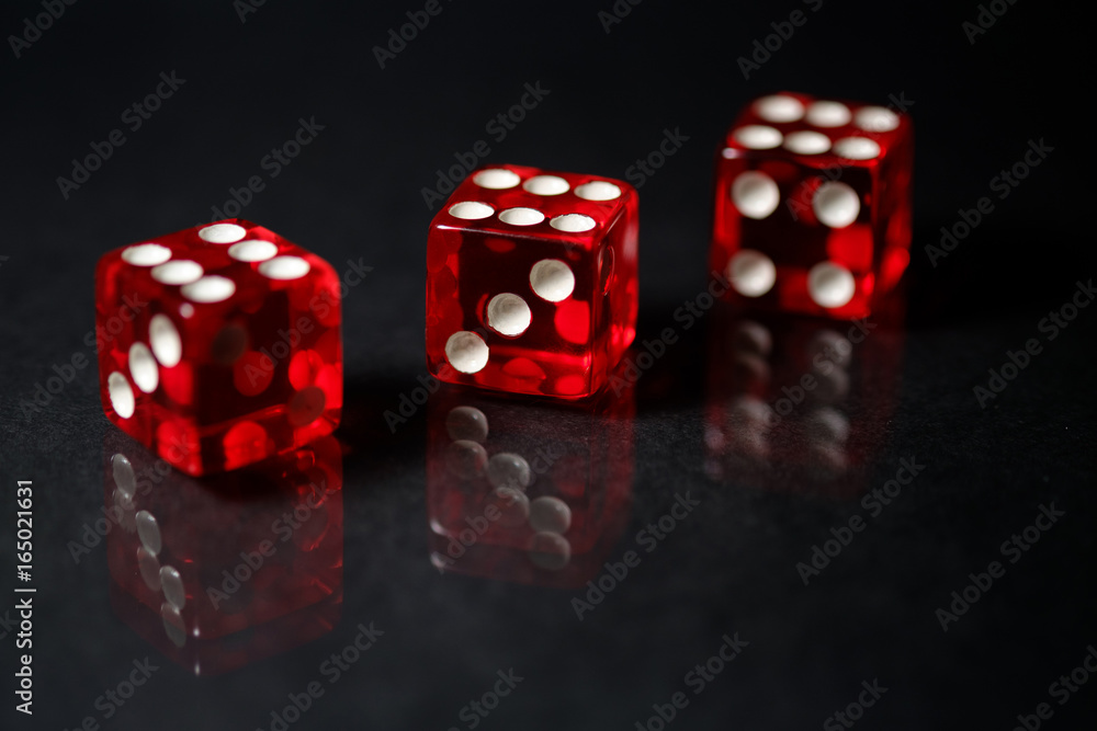 Red Sic Bo gambling dice with black isolated background Red Sic Bo gambling dice with black isolated background