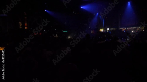 People dancing on the biggest dance floor in europe, in a nightclub