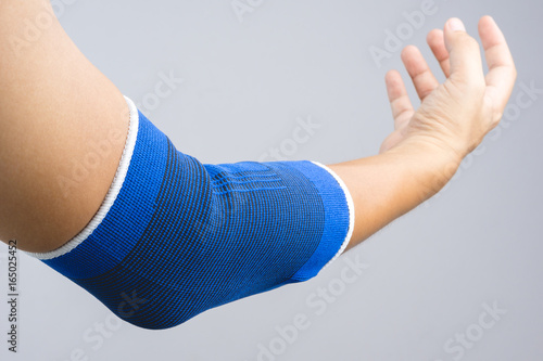 Photography Arm with elastic elbow support and hurt gesture