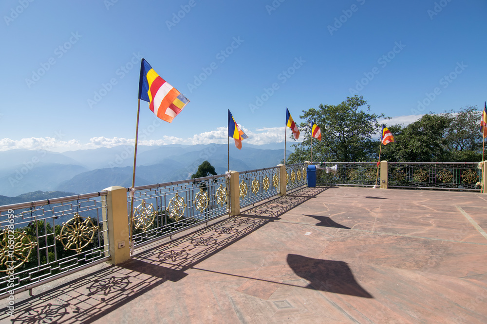 Courful Buddhist Prayer flags are flying in strong wind , Sikkim, India