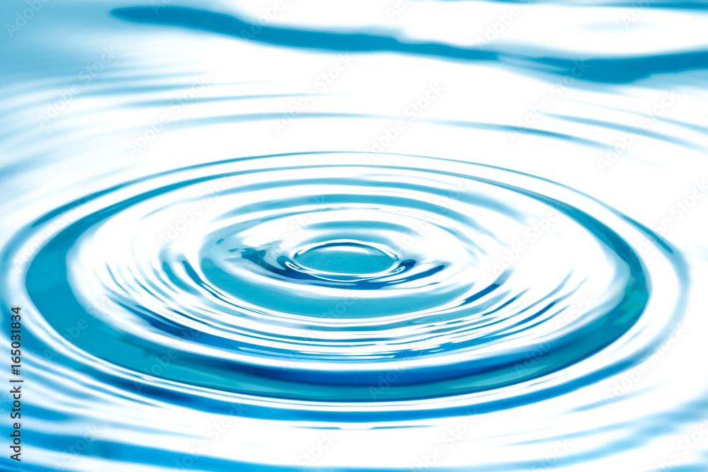 Water splashing droplets with ripples, abstract blue waves