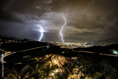 Lightning striking during a heavy storm over the city of city of Pereira, Colombia. photo