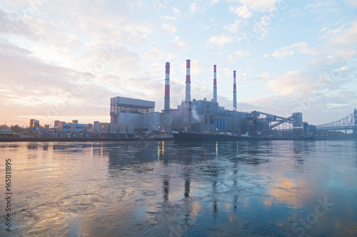 Photography New York city infrastructure on the shore of East River at dawn