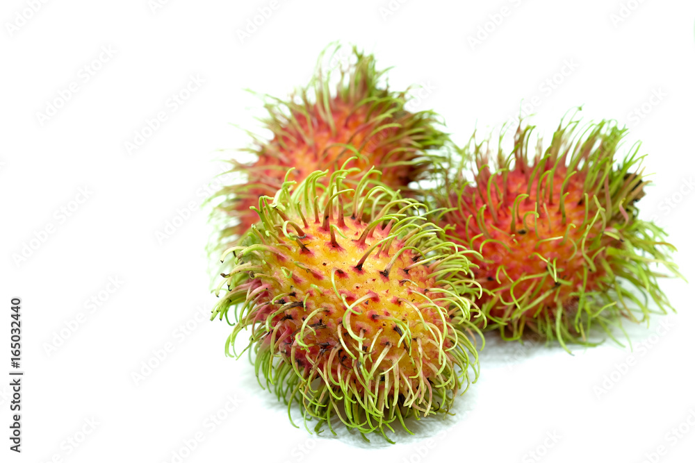 Rambutan on white background with selective focus Rambutan on white background with selective focus
