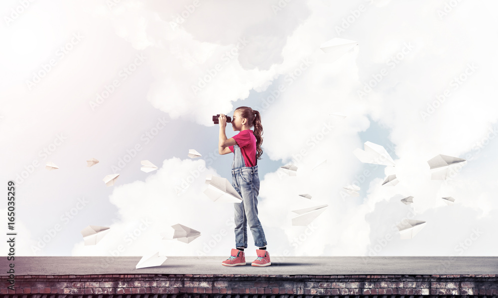 Concept of careless happy childhood with girl of school age look Concept of careless happy childhood with girl of school age look