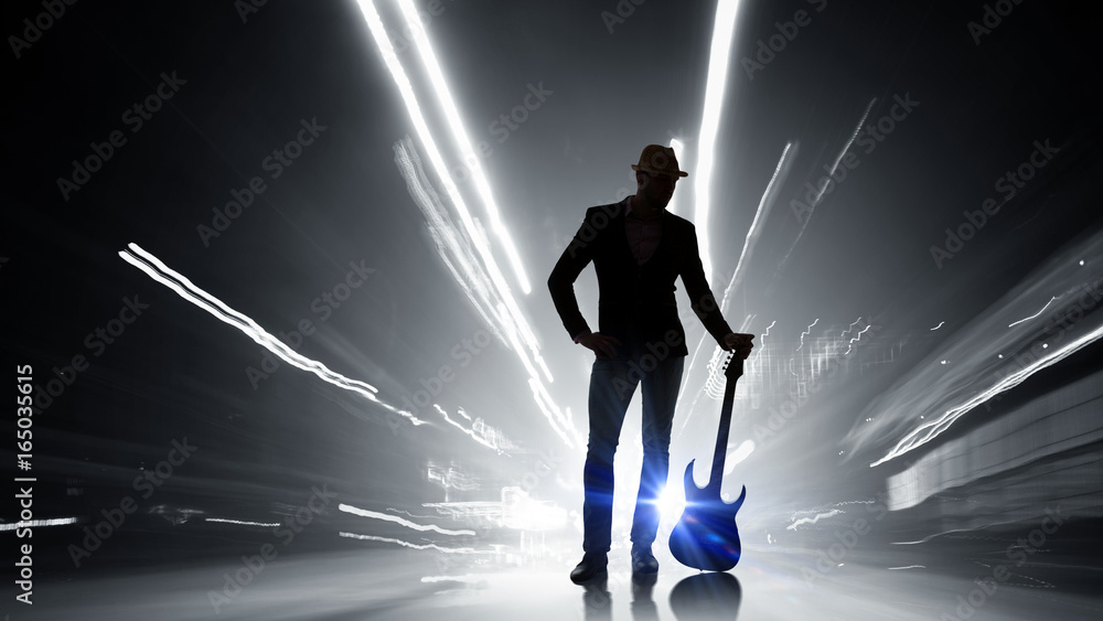 Rock guy with guitar. Mixed media Rock guy with guitar. Mixed media
