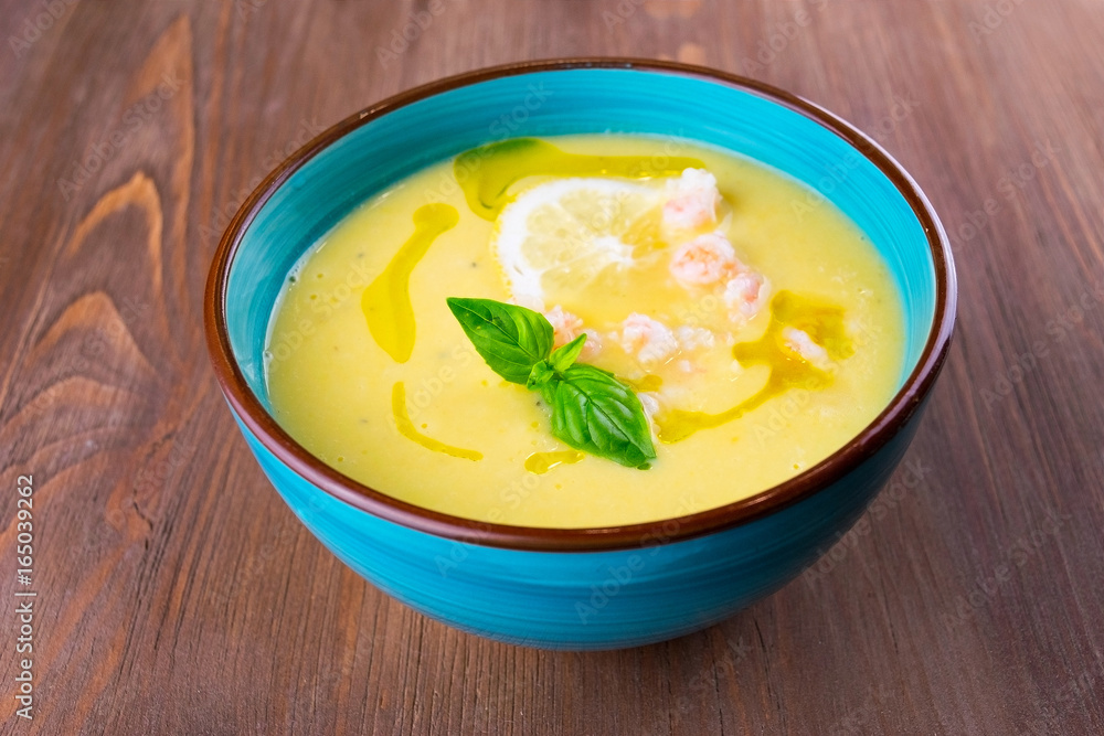 Vegetable soup puree with shrimps and lemon Vegetable soup puree with shrimps and lemon