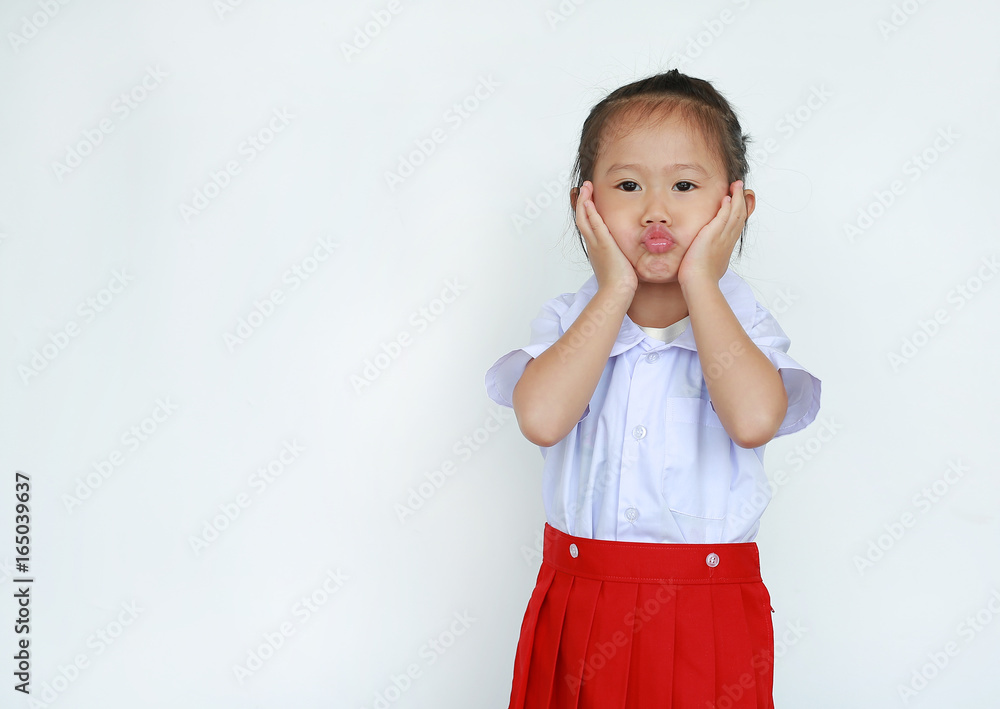 Portrait of asian child in school uniform isolated on white background. Portrait of asian child in school uniform isolated on white background.