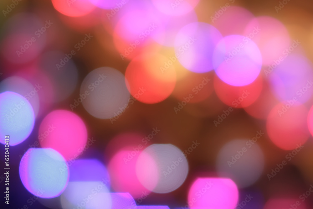 Colorful abstract blurred circular bokeh light of night city street for background, graphic design and website template idea concept.