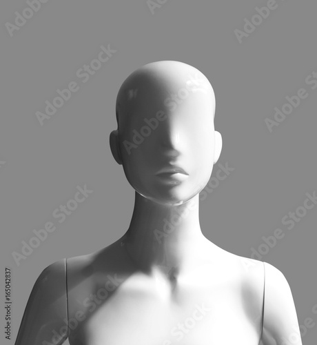 human female mannequin portrait photograph with light and shadow effects isolated on grey background photo