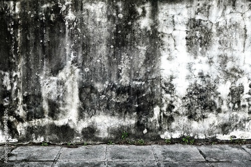 Old Concrete Wall with Pavement.