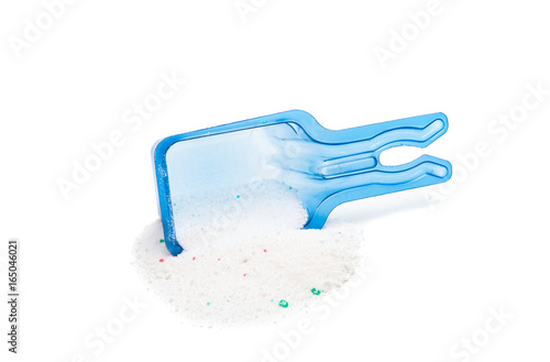 Measuring cup with washing powder isolated