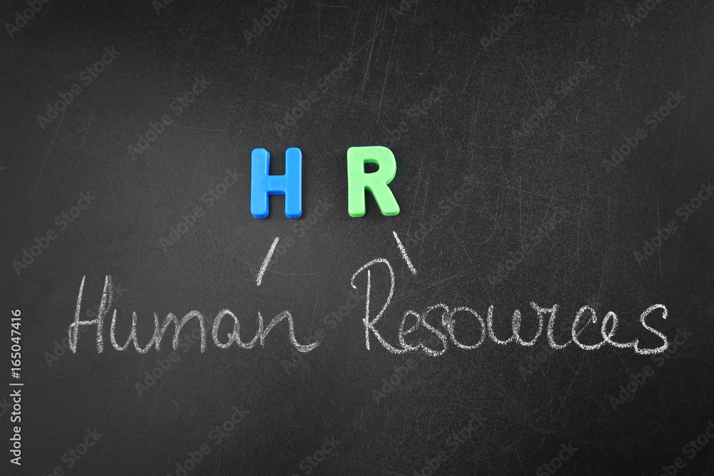 Obraz premium Phrase HUMAN RESOURCES written on blackboard. Management concept