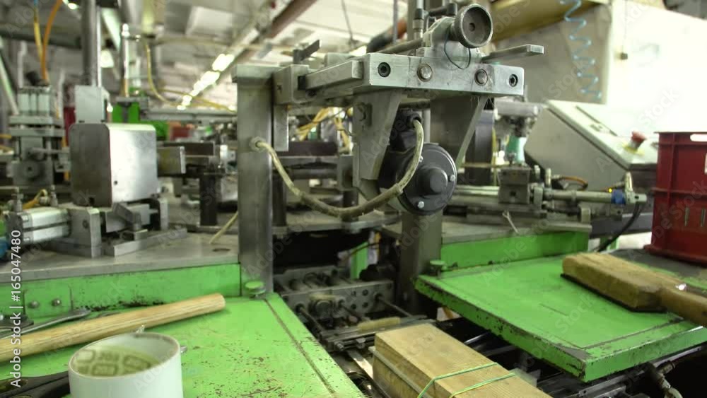 Installation of bristles for brushes, conveyer production close-up 4k. Installation of bristles for brushes, conveyer production close-up 4k.