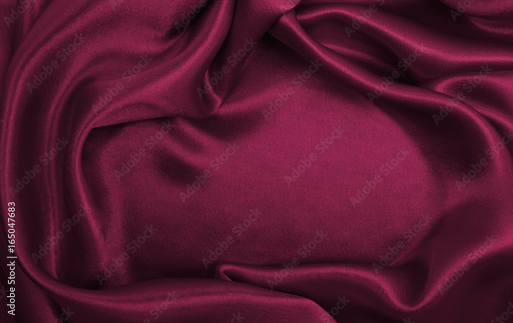 Obraz premium Smooth elegant pink silk or satin luxury cloth texture as abstract background. Luxurious background design