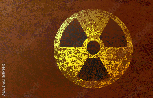 Radioactive hazard sign on a rusty, dirty background. Vector illustration