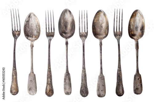 Vintage set of the Silver Spoons and Forks isolated on white.