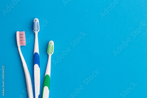Colorful toothbrushes, place for inscription photo
