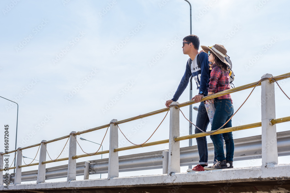 Male tourists enjoy the bridge. Male tourists enjoy the bridge.