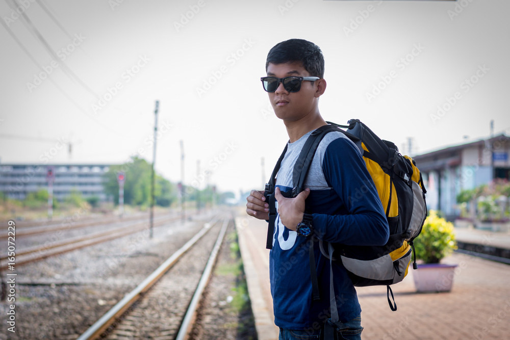 Tourists man are enjoying the train station. Tourists man are enjoying the train station.