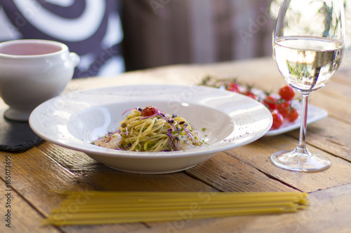 Aglio e olio (spaghetti with oil and garlic) with shrimps and strawberry soup with mascarpone