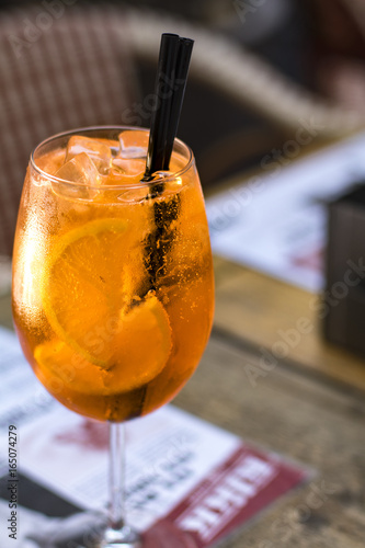 A glass of aperol spritz cocktail