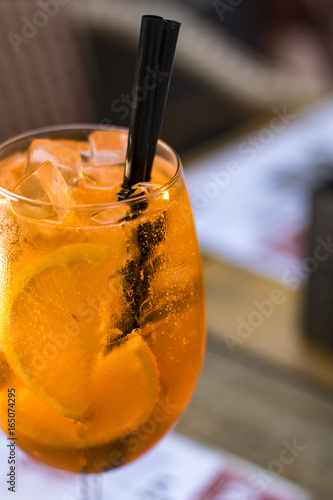 A glass of aperol spritz cocktail