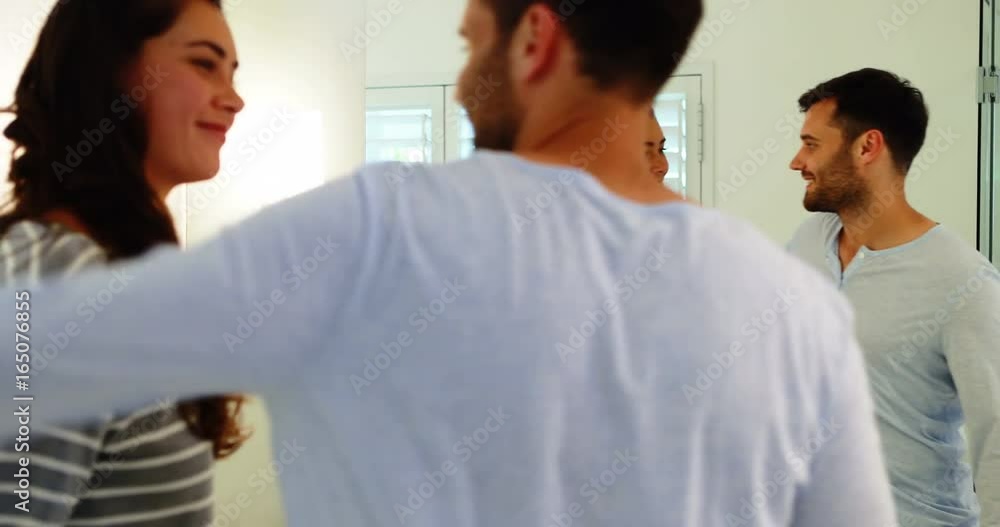 Smiling couple interacting with each other in bathroom Smiling couple interacting with each other in bathroom