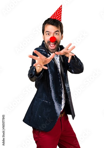 Man with jacket with clown nose