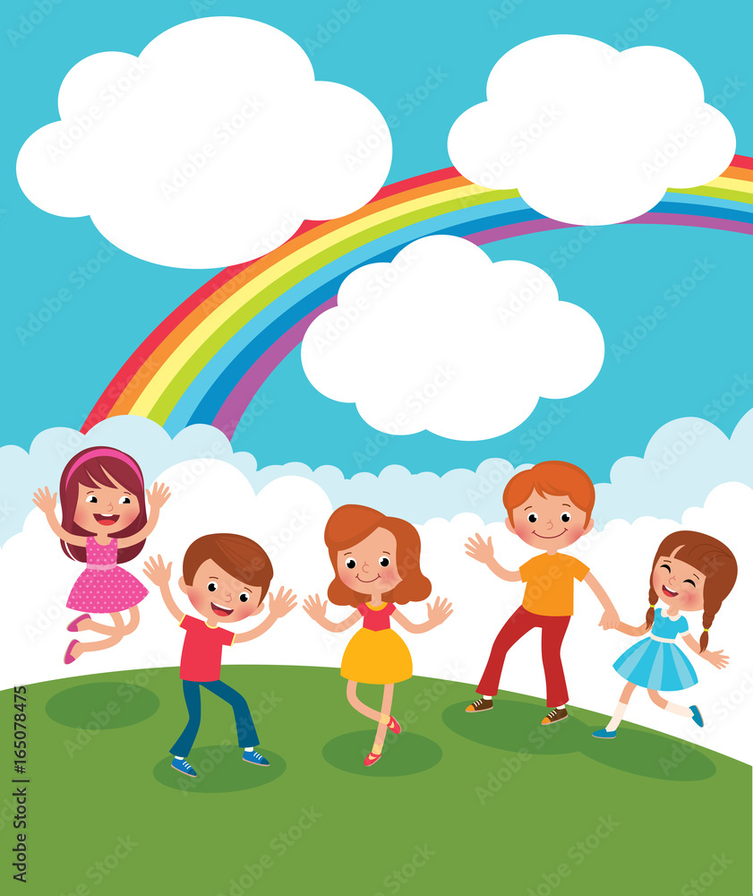 Group of kids playing and having fun in the meadow under the rainbow