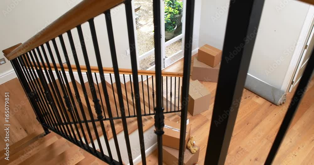 Interior of home with wooden floor and staircase Interior of home with wooden floor and staircase