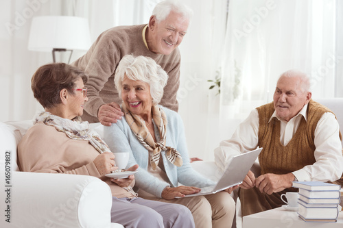 Friendly conversation of elderly neighbours