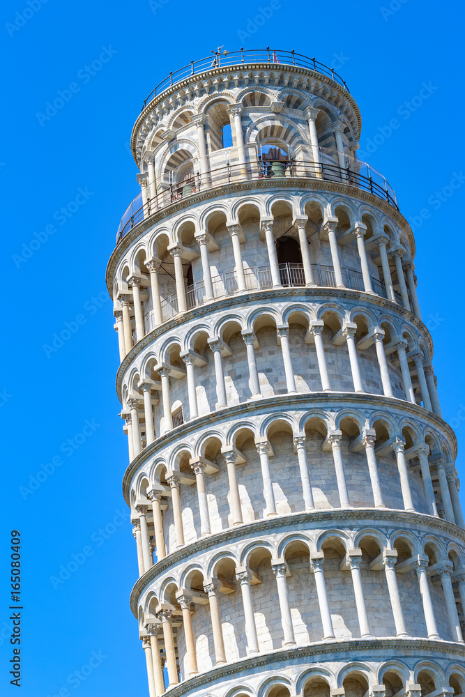 Leaning tower of Pisa, Italy against a cloudless blue sky