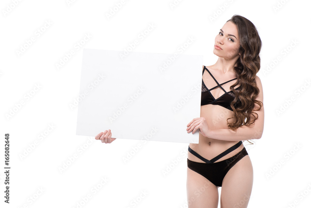 beautiful young woman in black lingerie holding blank banner, isolated on white beautiful young woman in black lingerie holding blank banner, isolated on white