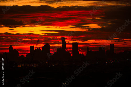 On Sunset and twilight sky, Silhouette image of metropolises.