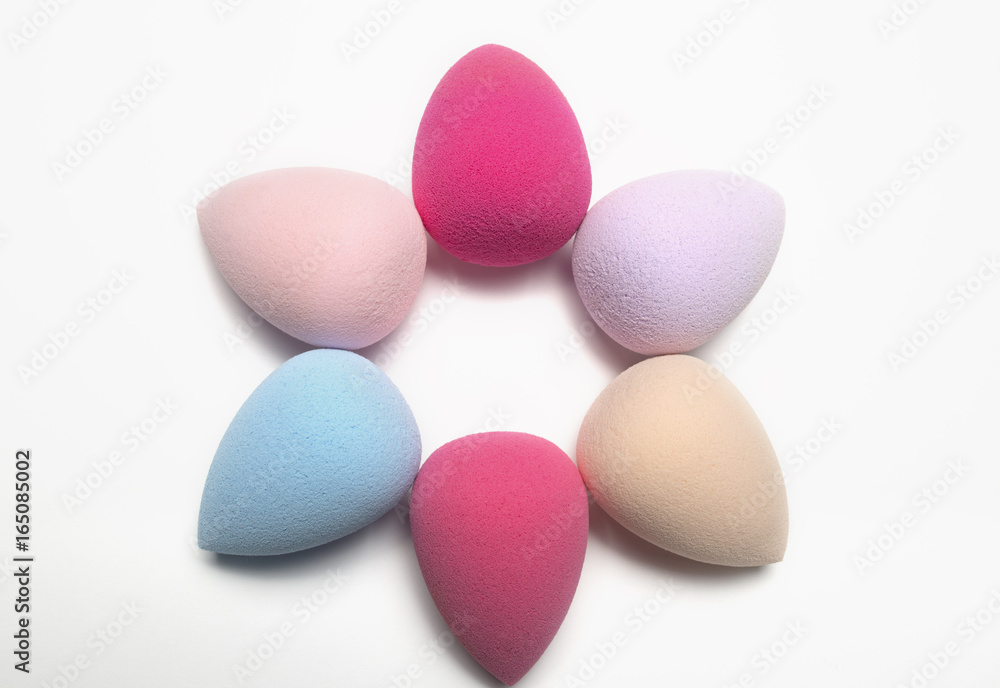 Set of colored beauty blenders on a white background Set of colored beauty blenders on a white background