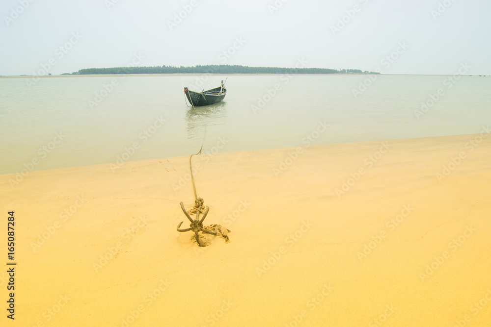 High key image of boat and anchor, Tajpur, West Bengal, India