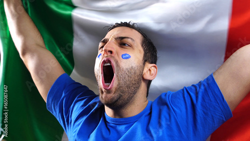 Italian Guy Celebrating with Italy Flag photo