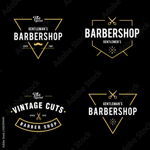 Set of vintage barber shop badges and labels design elements